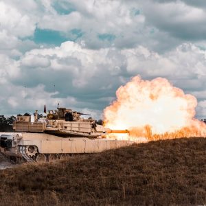 Foam blast mitigation polyurea coating protecting military structure from explosive forces